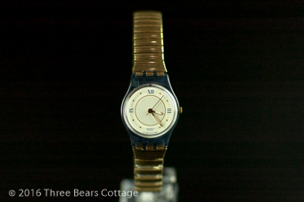 A small standard Swatch dial
