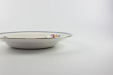Side profile view of a British Anchor Pottery serving dish.