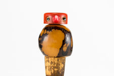 Close up side view 1 of Tagua Nut bird bottle stopper