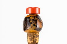 Close up side view 3 of Tagua Nut bird bottle stopper