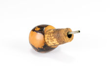 Side view 1 of pourer of Tagua Nut bird bottle stopper