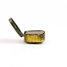 Side view of open lid of needles in Broadcast Gramophone Needles Tin