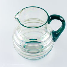 Angled top view of Iridescent Ribbed Glass Jug with Blue-Green Handle