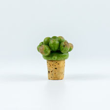 Front on view of a Wooden Green Grape Cluster Bottle Stopper