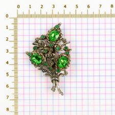Size demonstration of Green Rhinestone Bouquet Brooch